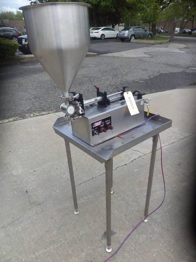 Used REB Air Operated Tabletop Single Piston Filler, with Hopper