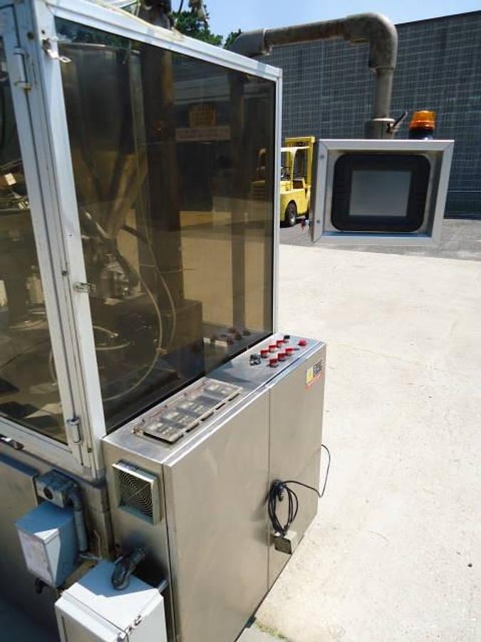 Used Comadis C100 automatic tube filler/sealer, high frequency sealing