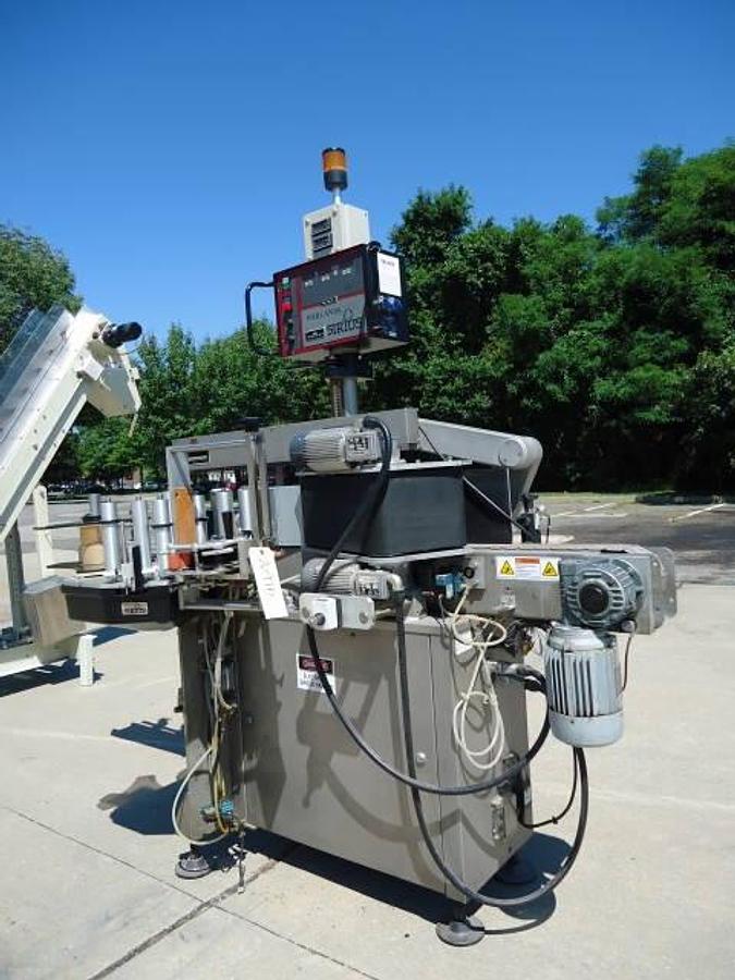 Used HARLAND “SIRIUS” AUTO SPOT/WRAP AROUND PRESSURE SENSITIVE LABELER, In. High Labels