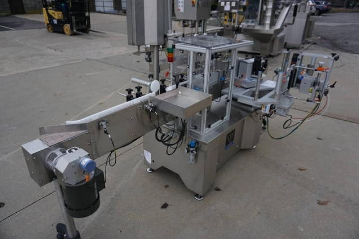 Used Aesus Systems “Eco Wrap Prism” Automatic Pressure Sensitive Spot/Wrap Around Labeler, Stainless Steel