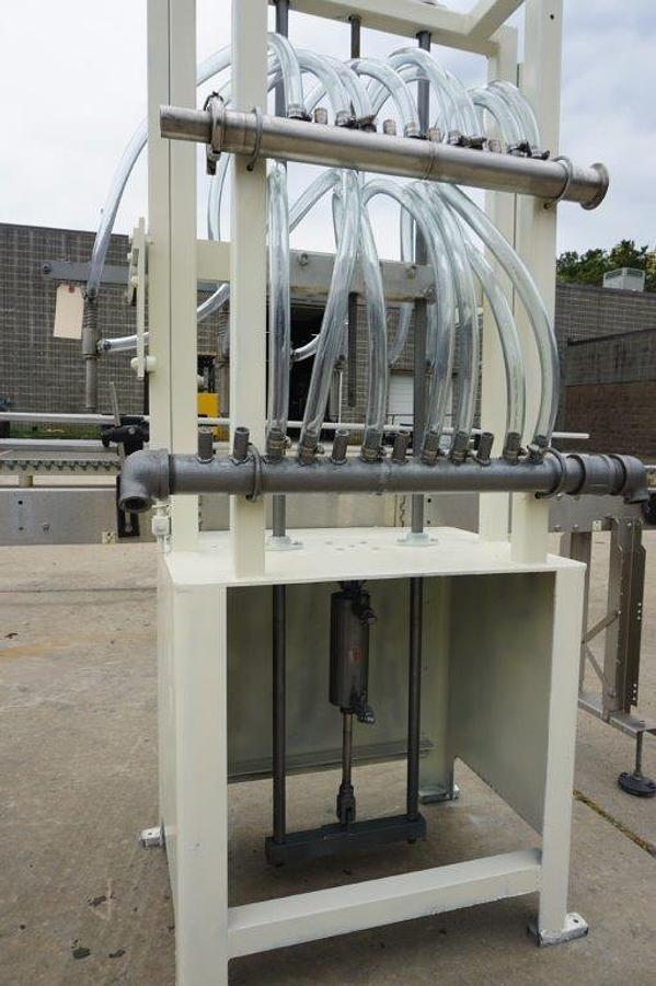 Used RJM 8 Spout Straight Line Liquid Filling Machine, Pressure Gravity Nozzles