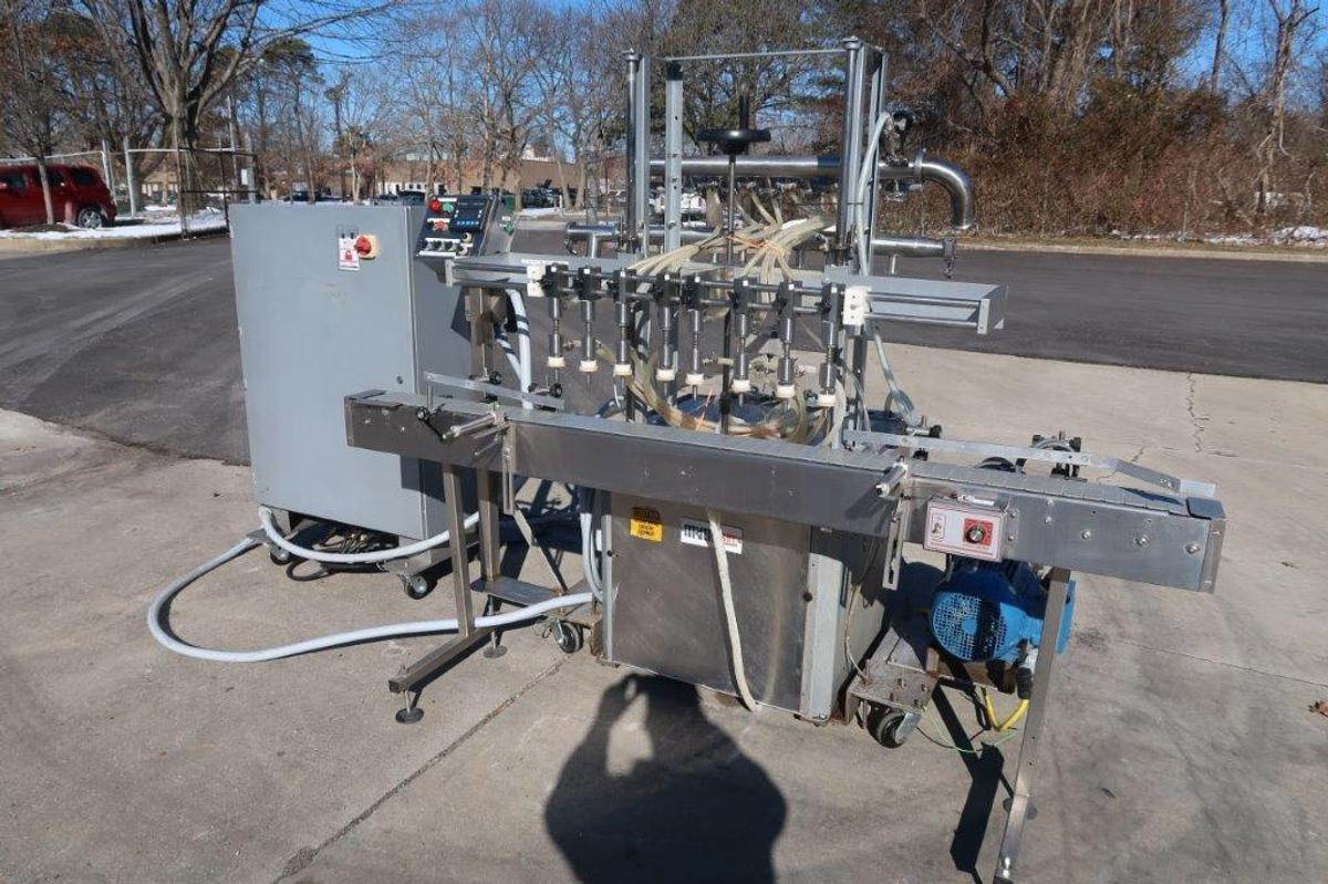Used MRM/Elgin 8-Head Straightline Overflow Filling Machine