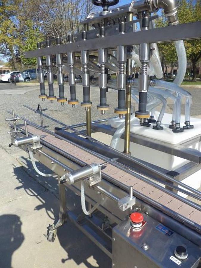Used Packaging Dynamics Eight Spout Stainless Steel Portable Straight Line Liquid Filler, Explosion Proof