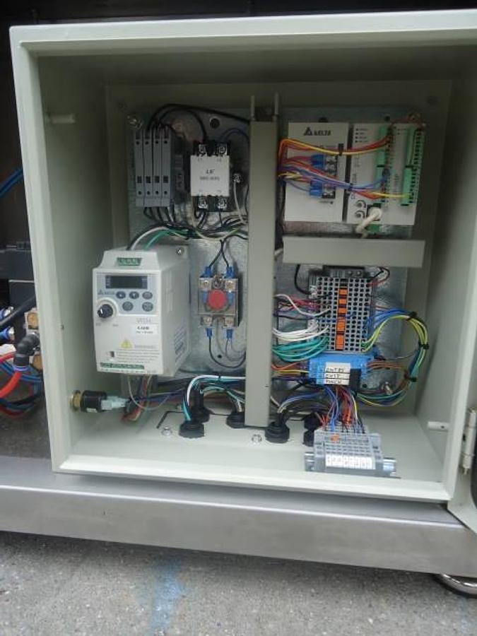 Used Accutek “Auto-Pinch 25” Six-Head Liquid Filler