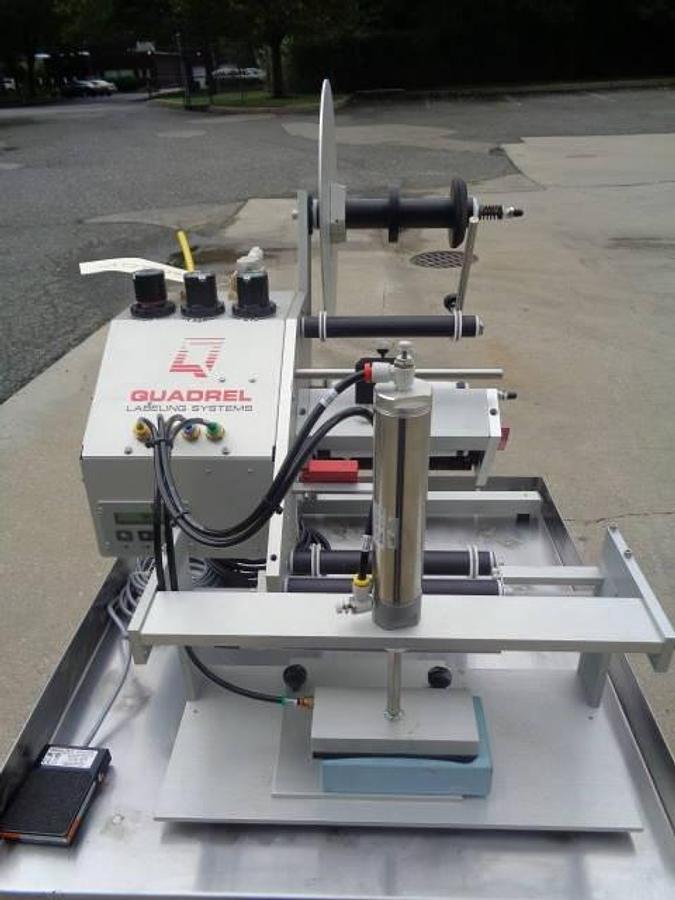 Used Quadrel Tabletop Pressure Sensitive Labelling Machine