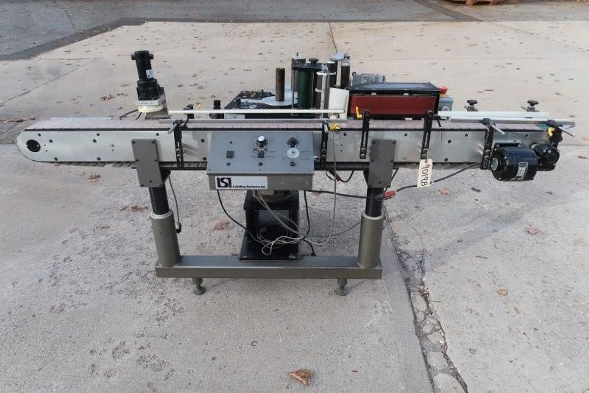 Used LSI Auto Pressure Sensitive Wraparound Labeler with Coder