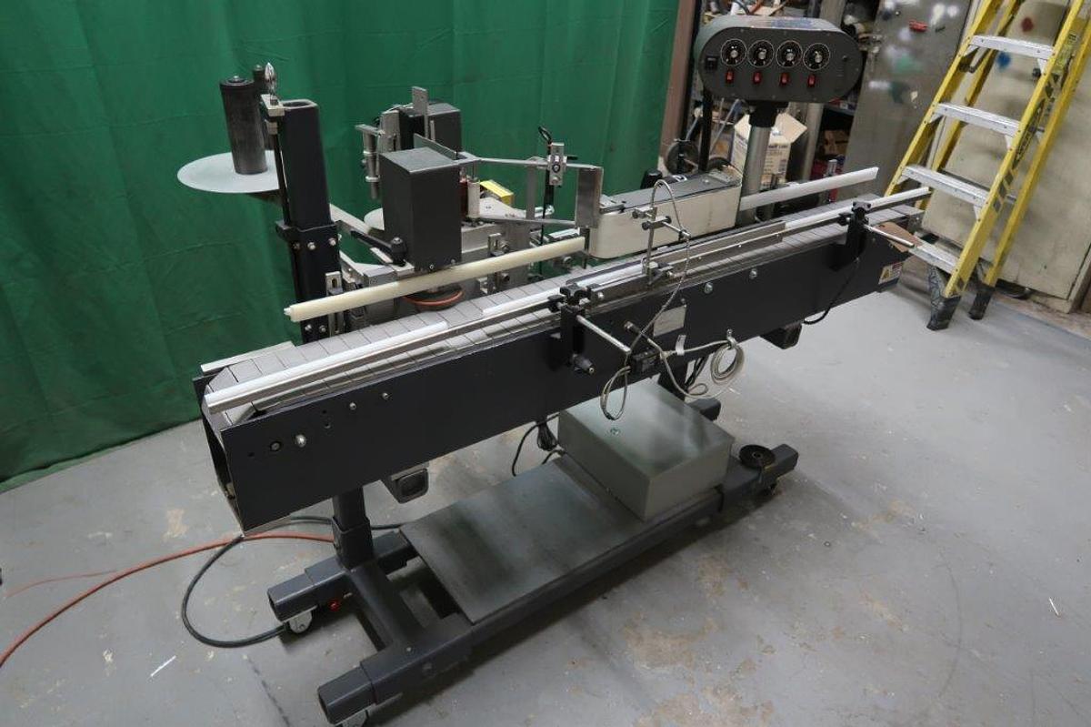 Used Universal R-320 Automatic Pressure Sensitive Labeling Machine, Portable