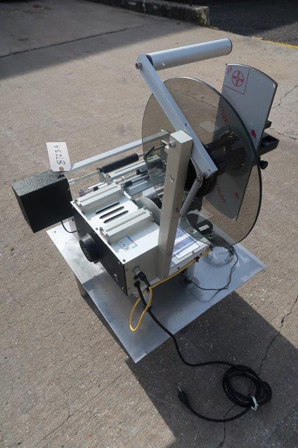 Used Universal R-310 Tabletop Semi-Automatic Pressure Sensitive Spot/Wraparound Labeler