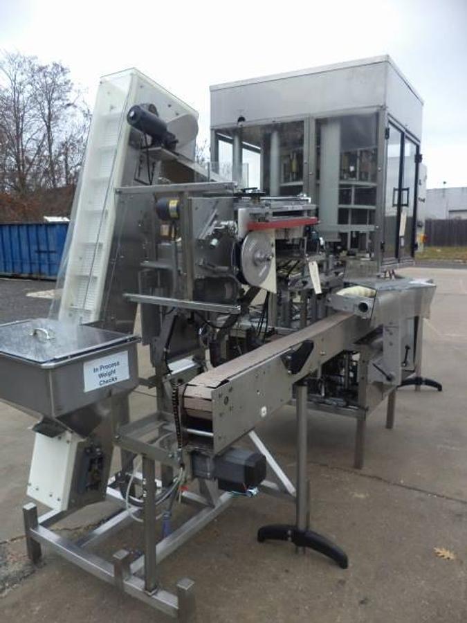 Used New England Machinery Ten Head Rotary Capper With  Feeder/Unscrambler