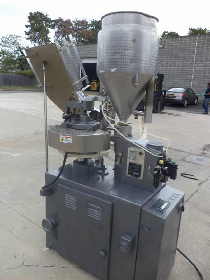 Used Comadis automatic plastic radiant heat tube filler