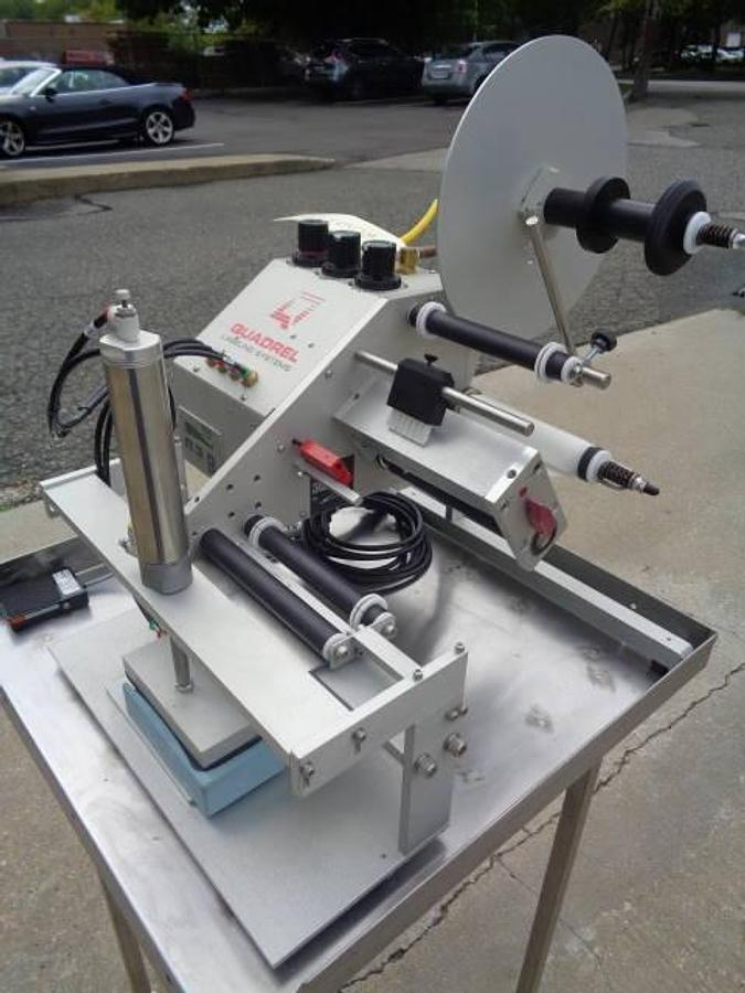 Used Quadrel Tabletop Pressure Sensitive Labelling Machine