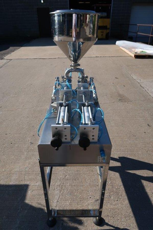 Used Quantitative Dual Head Air Operated Stainless Piston Filler, with Foot Switch