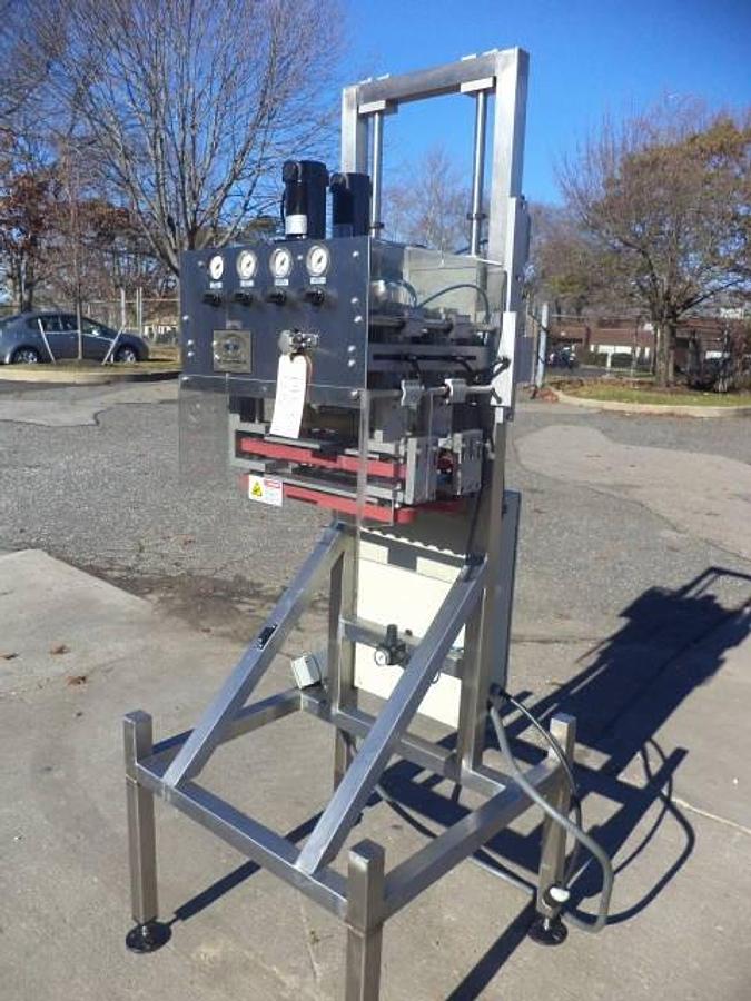 Used New England Four Spindle Cap Tightener, Single Phase