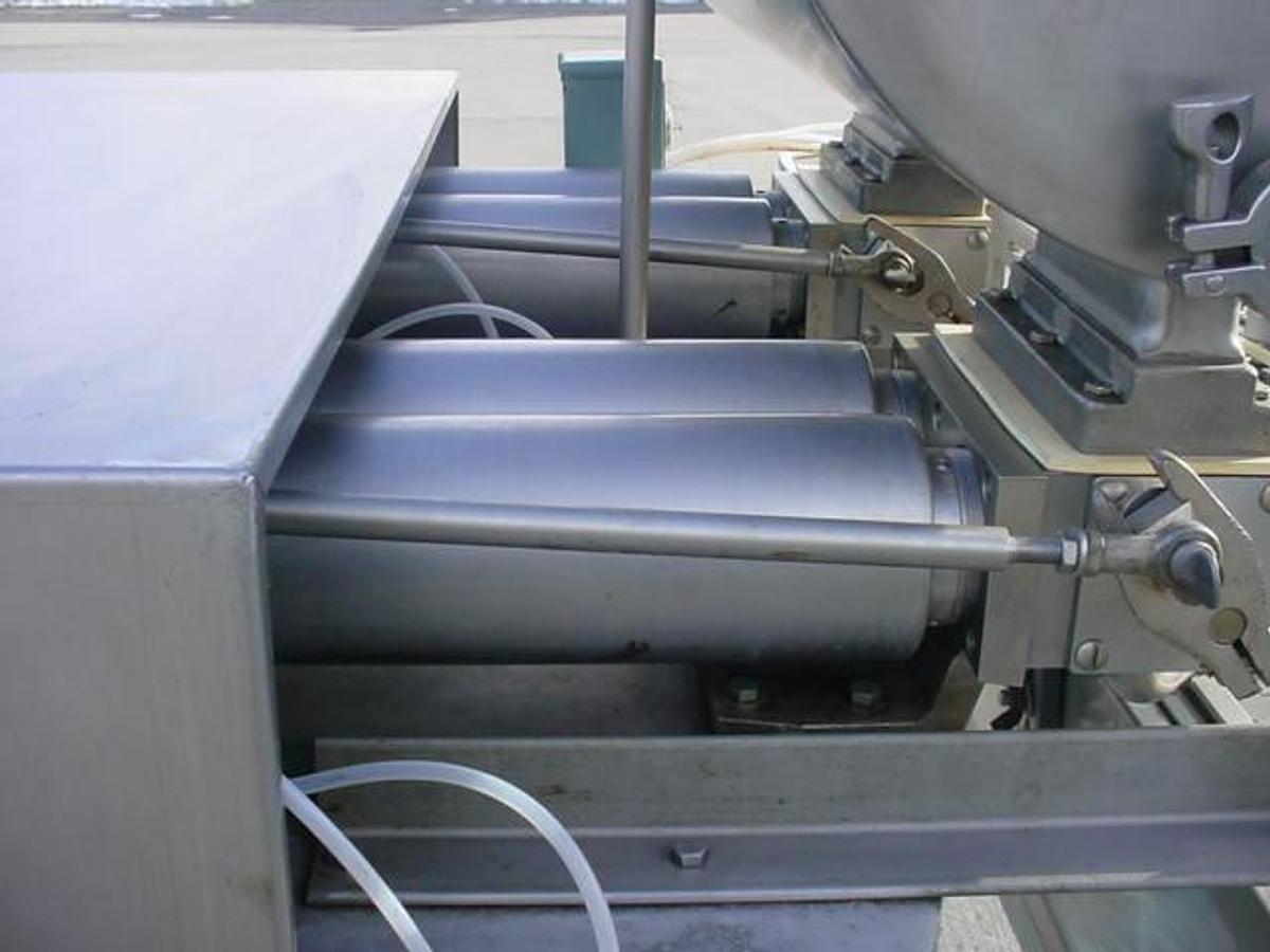 Used SIMPLEX “DUAL T”” FOUR PISTON AUTOMATIC FILLER, Large Fills