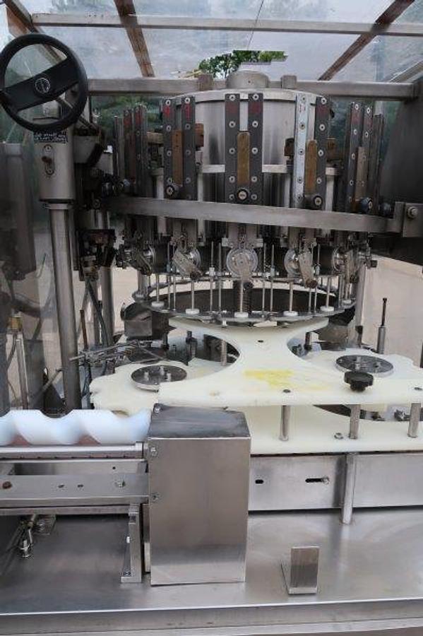 Used MRM/Elgin 16 Head Rotary Piston Filler, up to 32 Oz.