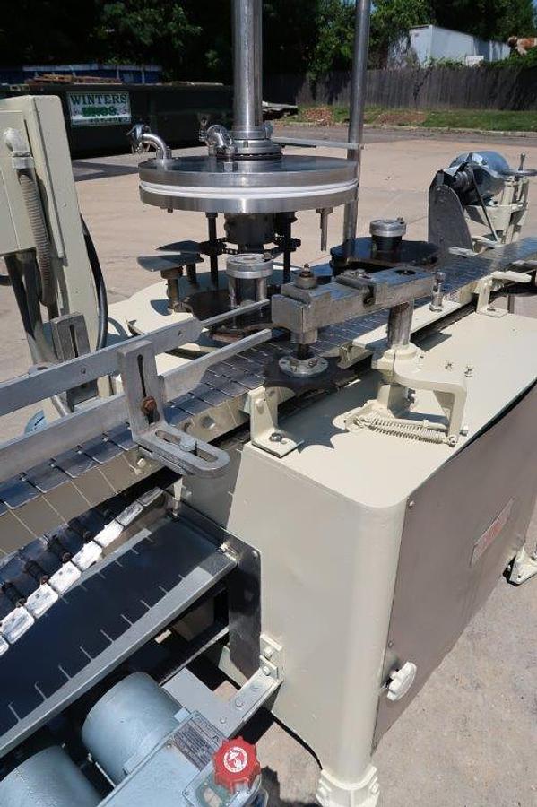 Used MRM “Versa-Fil” Six Head Rotary Time and Pressure Positive Displacement Filling Machine, with Waukesha Pump
