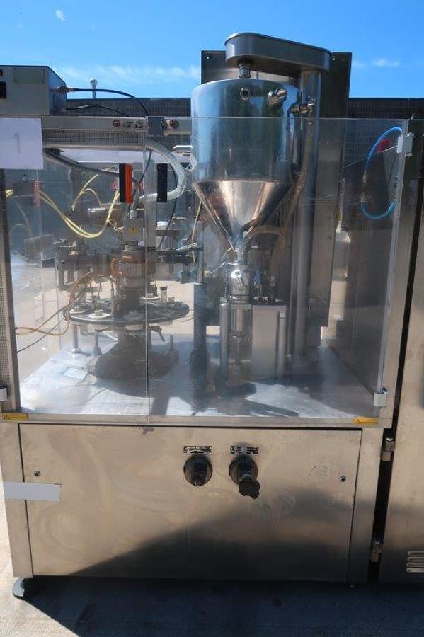 Used Axomatic “AXO-1000Matic” Tube Filling and Sealing Machine, Misc. Tooling