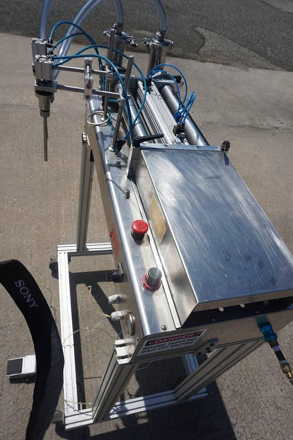 Used Twin Piston Filling Machine, Air Operated