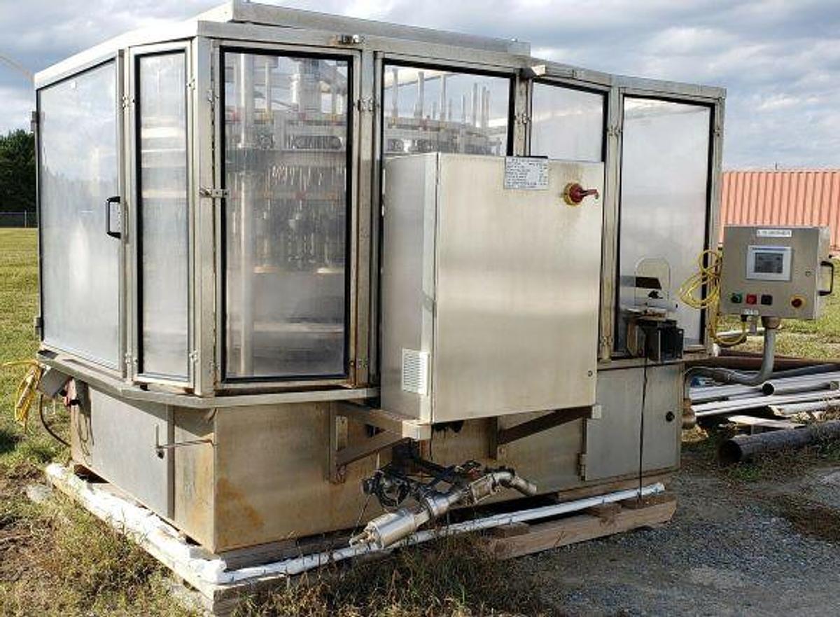Used U.S. Bottlers 42 Valve Rotary Filling Machine