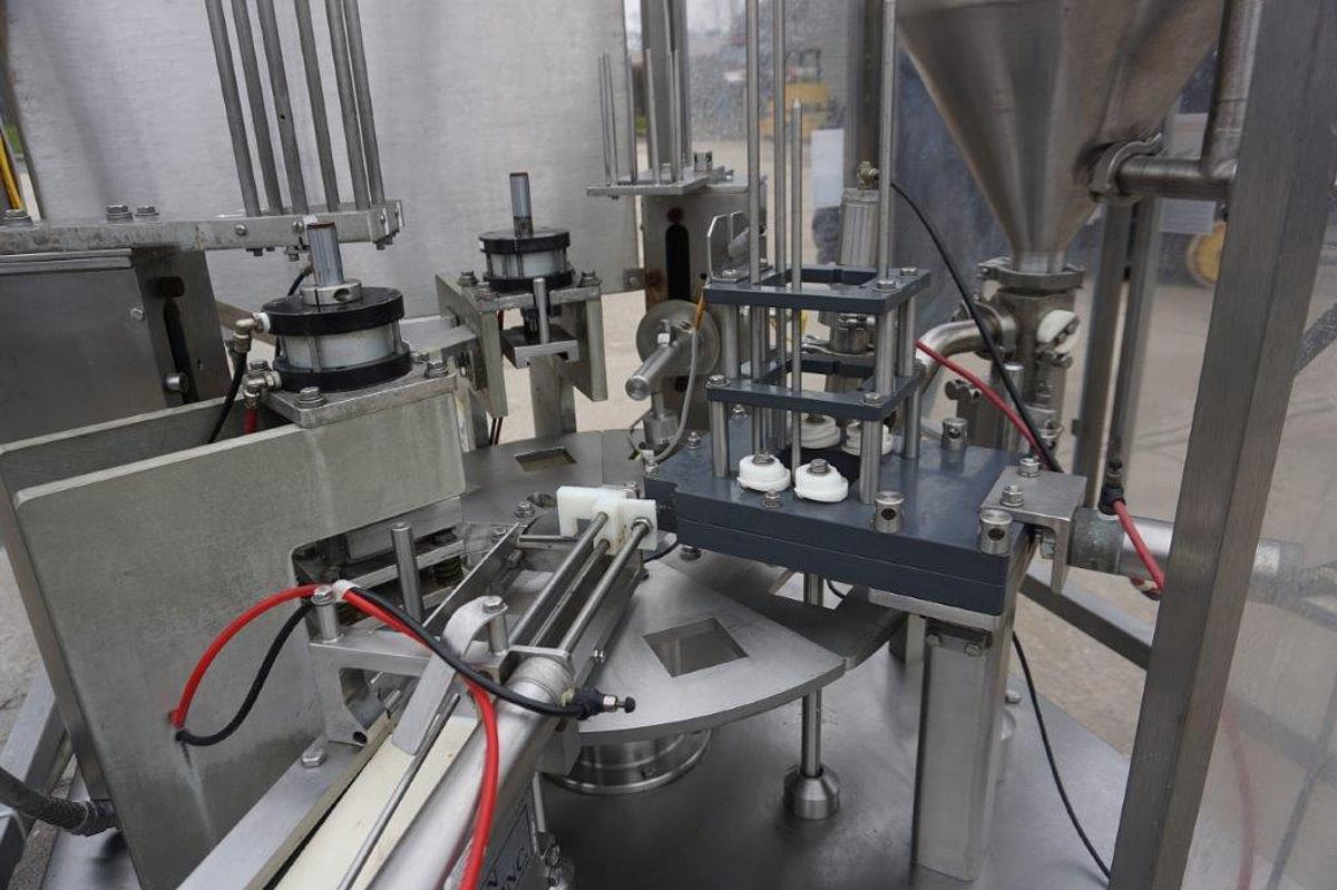 Used Modern Packaging MR Series Rotary Cup Filling and Sealing Machine