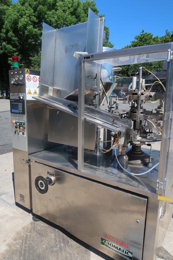 Used Axomatic “AXO-1000Matic” Tube Filling and Sealing Machine, Misc. Tooling