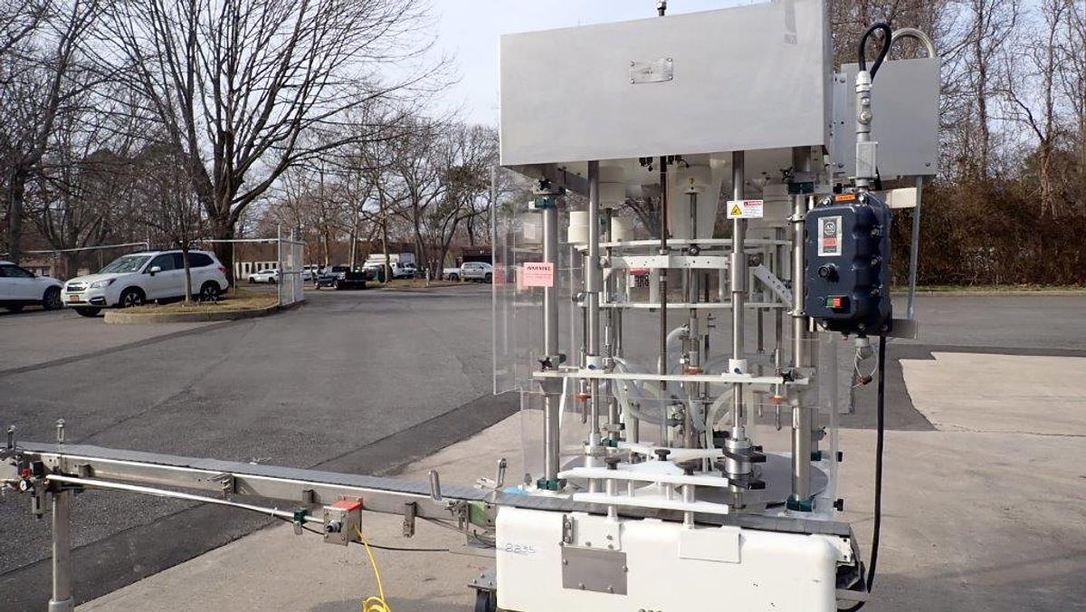 Used MRM 8 Spout Rotary Pressure Gravity Filler, XP
