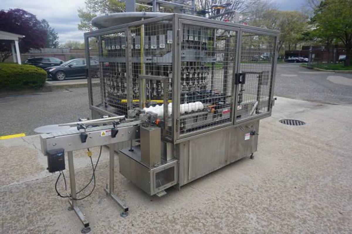 Used U.S. Bottlers 48 Valve Rotary Gravity Filling Machine, Last Filling Alcohol