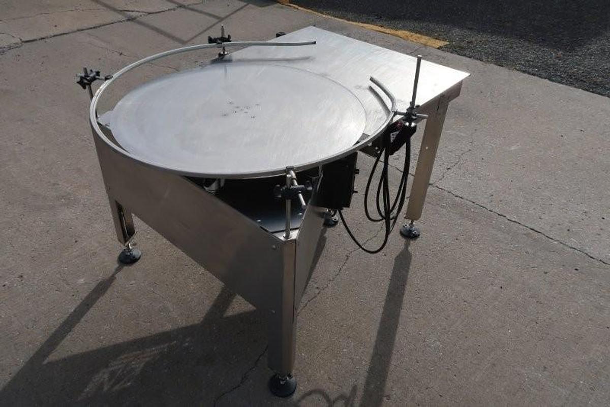 Used Oden 36 In. Diameter Rotary Unscrambling/Accumulating Table, with Shelf