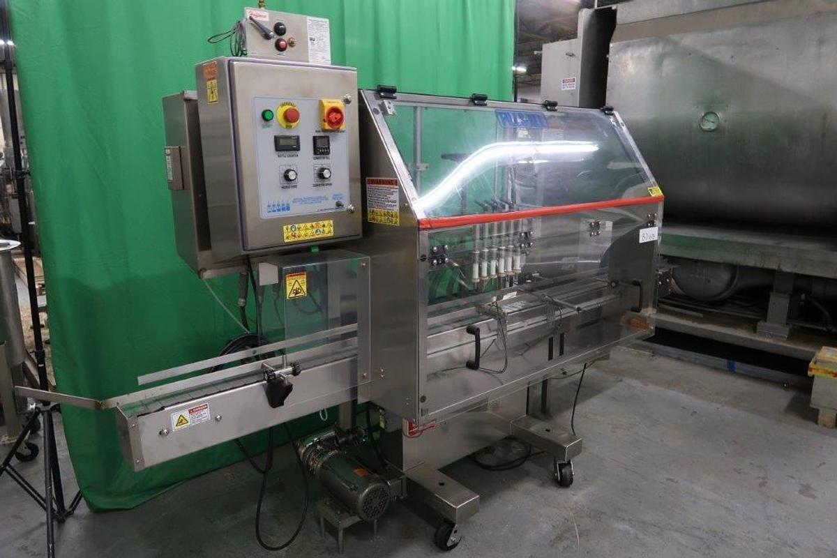 Used Kaps-All Automatic Liquid Filling Line with Capper, Cleaner, Rotary Tables