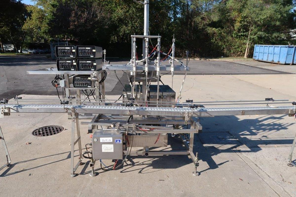 Used Oden Four Head Pump Style Positive Displacement Filler