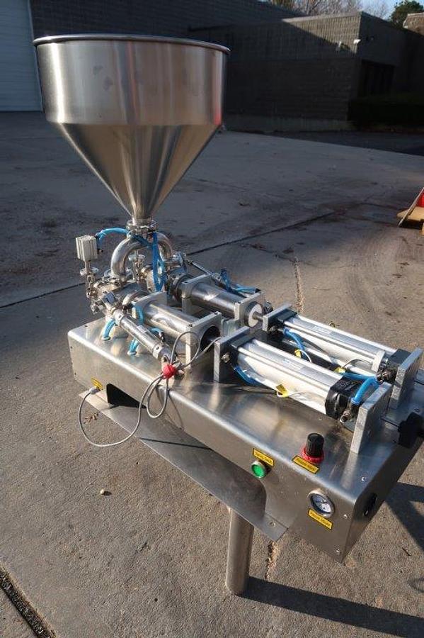 Used Tabletop Air Operated Dual Head Piston Filler,  Stainless Steel