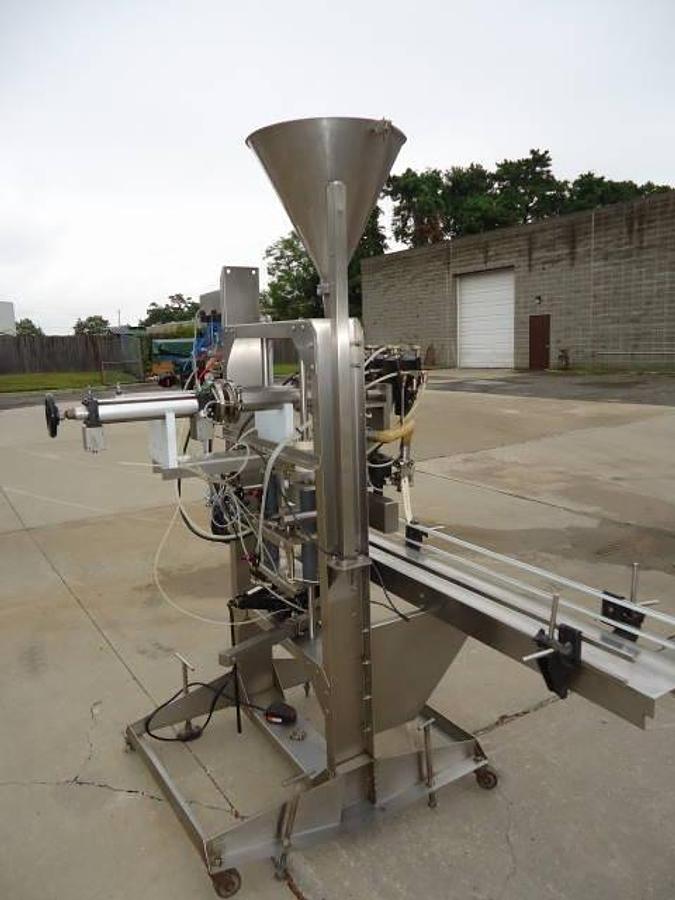 Used E-Pack Pneumatic Two Head Piston Filler