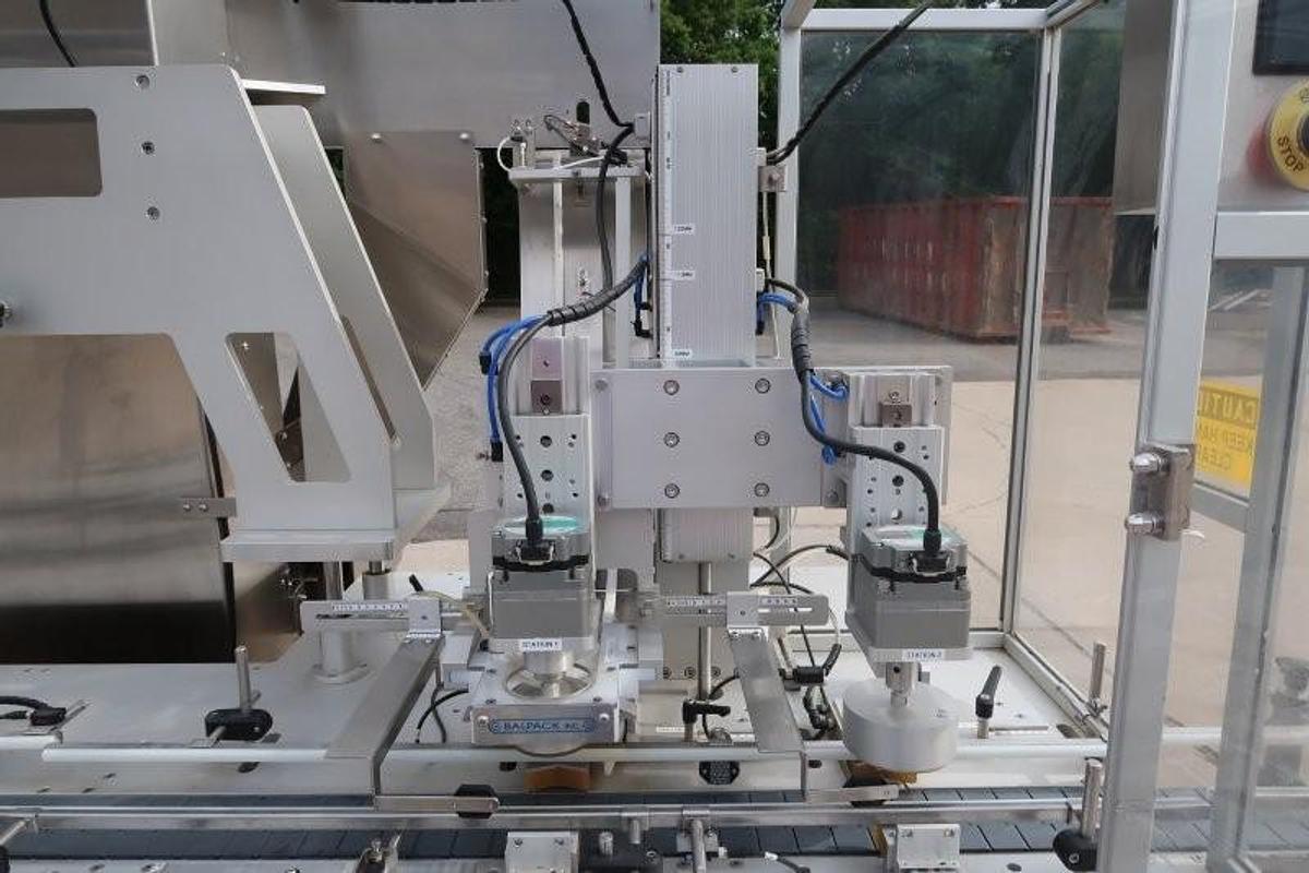 Used Balpack Automatic CEIB Inline Dual Station Chuck Capper