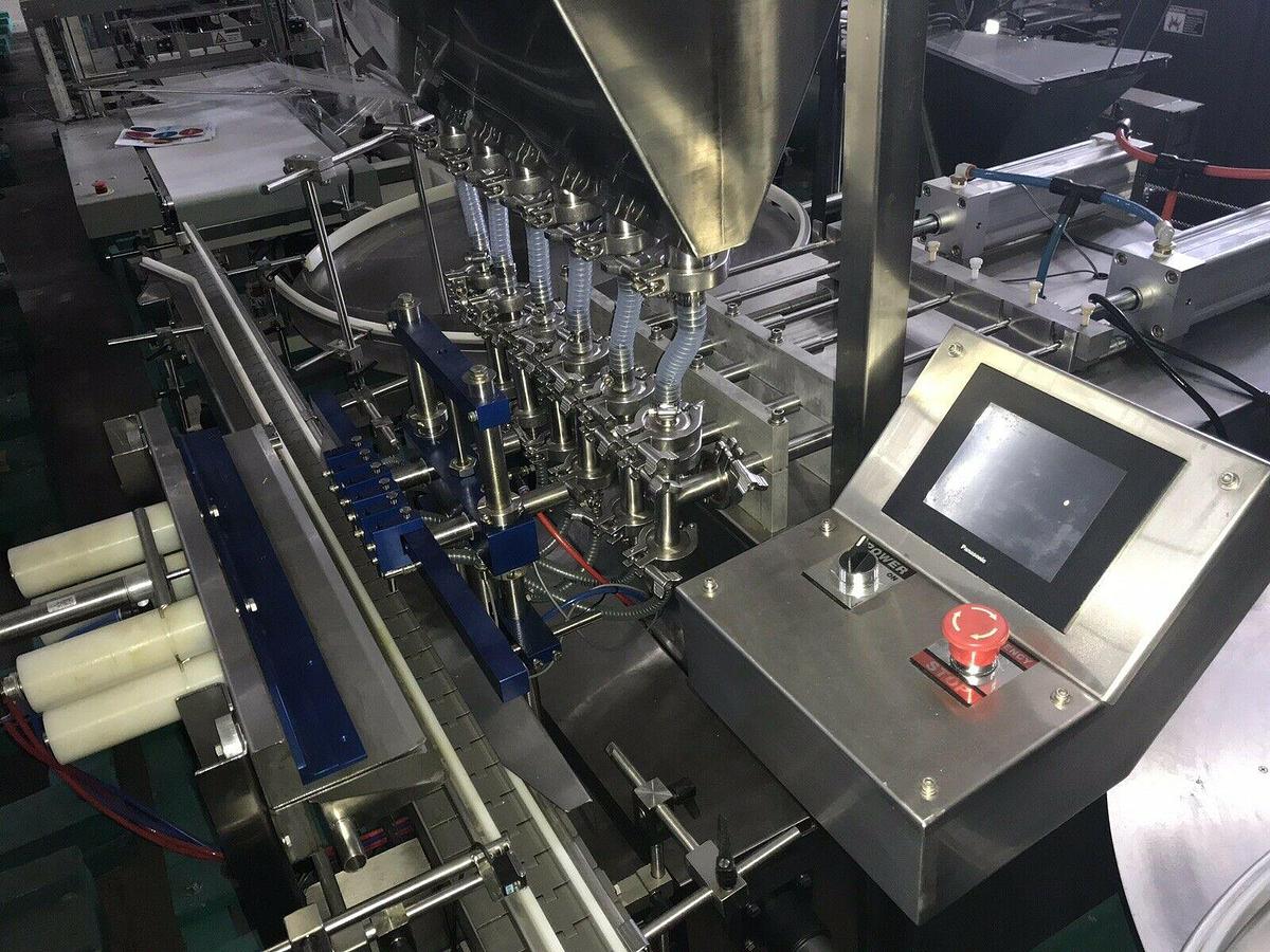 Used Accutek Six Piston Fully Automatic Straightline Filling Machine