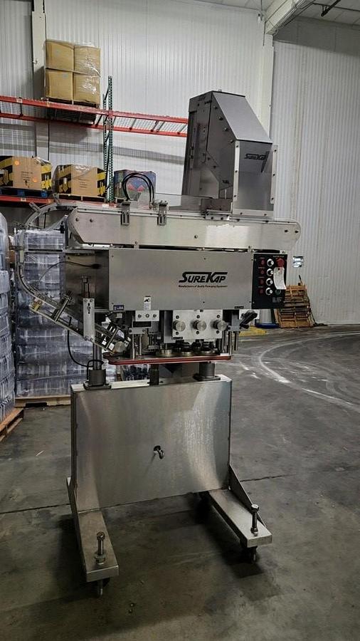 Used Surekap SK6000-BF6 Six Spindler Screw Capper with Elevator, Stainless