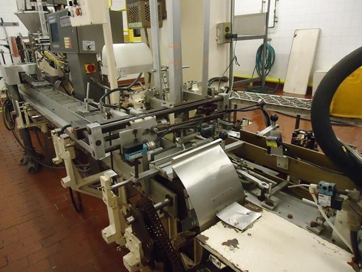 Used Bartelt IM-6 Horizontal Pouch Packager With Hot Melt Cartoner
