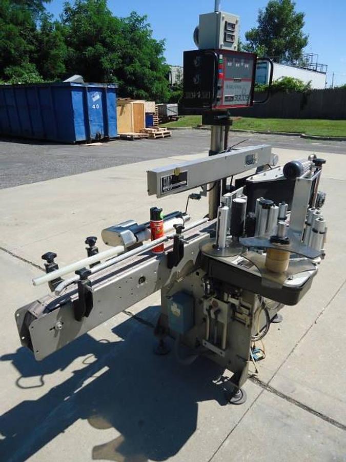 Used HARLAND “SIRIUS” AUTO SPOT/WRAP AROUND PRESSURE SENSITIVE LABELER, In. High Labels