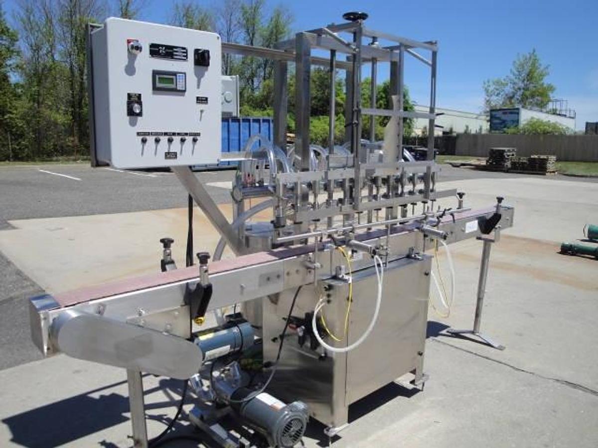 Used Packaging Dynamics Twelve Spout Stainless Automatic Liquid Filler