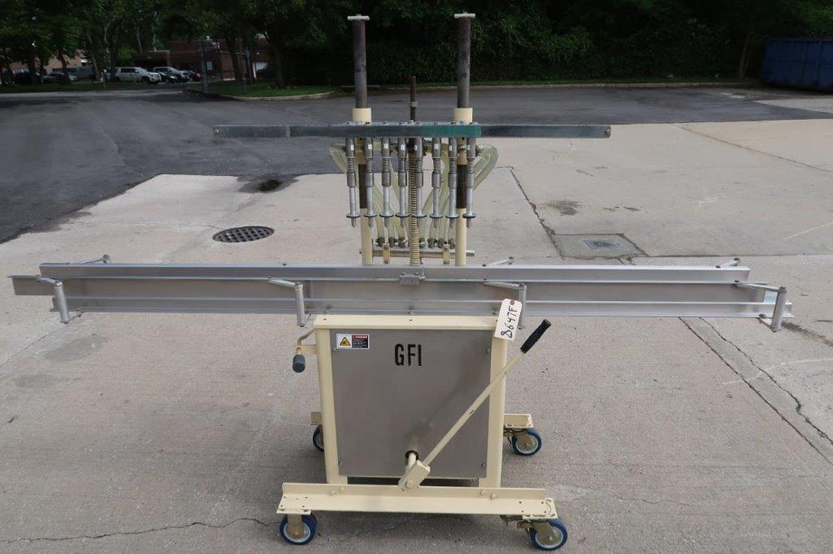 Used 8 Spout Semi-Automatic Liquid Filler, Portable