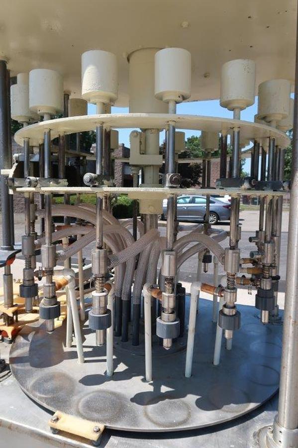 Used Packaging Dynamics 16 Spout Rotary Pressure Gravity Filling Machine, 8-1/2 In. Centers