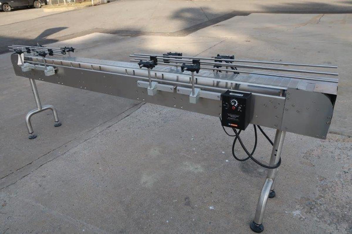 Used 4.5 In. x 9 Ft. SS Motorized Bottle Conveyor, Variable Speed