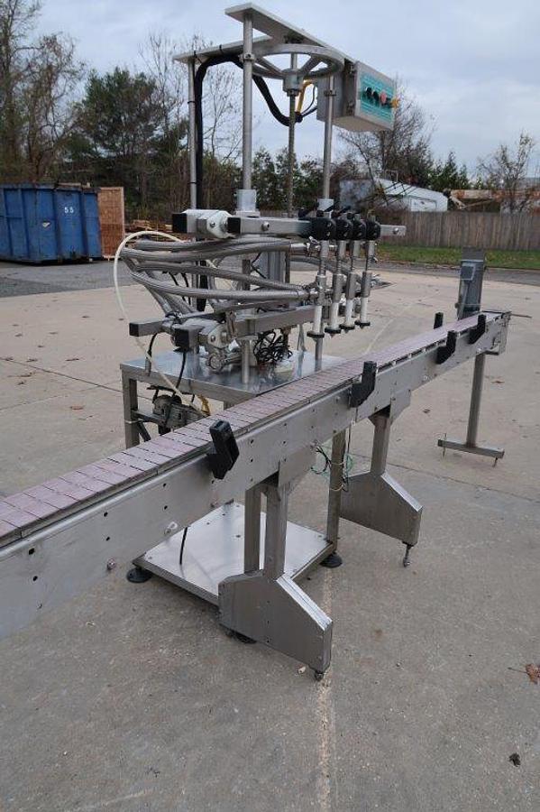 Used Inline Filling Systems 4 Spout Overflow Straight Line Liquid Filler, Stainless Steel