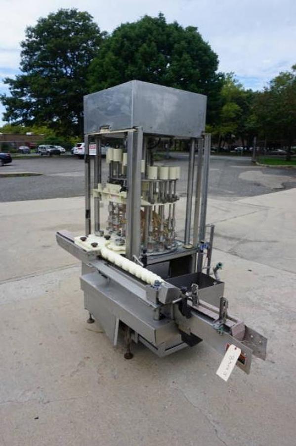 Used 18 Head Rotary Pressure Gravity Liquid Filling Machine