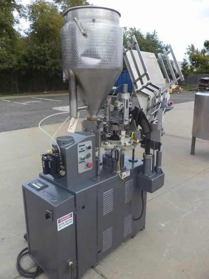 Used Comadis automatic plastic radiant heat tube filler