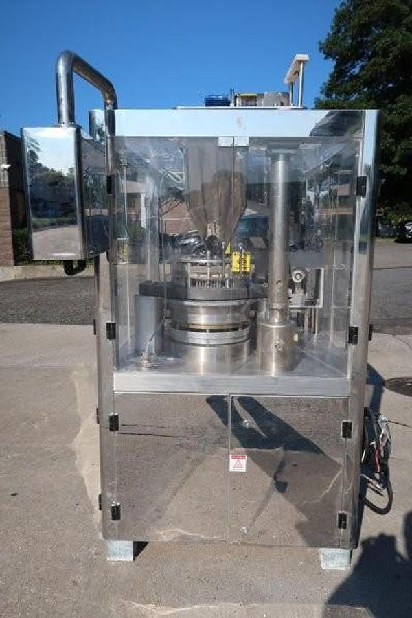Used Tradamax Equipment and Supply Automatic capsule Filling Machine, 11 Station