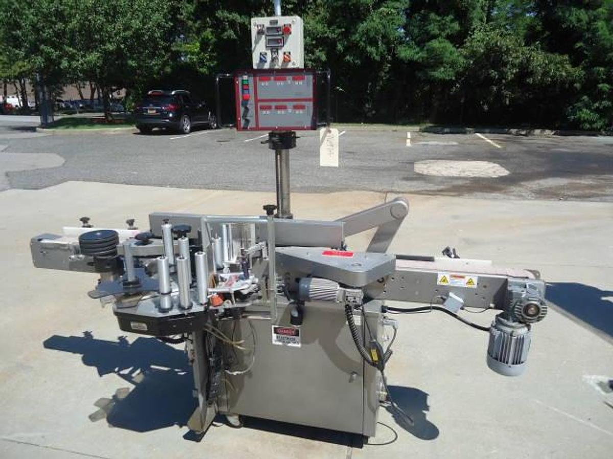 Used Harland “Sirius” Spot/Wrap Around Labeler With Coder