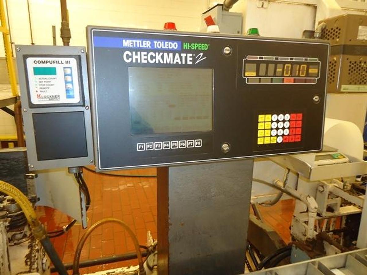Used Bartelt IM-6 Horizontal Pouch Packager With Hot Melt Cartoner