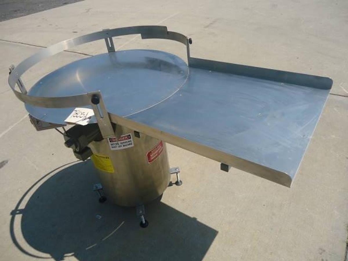 Used 36 Inch diameter Kaps All rotary unscrambling table, stainless steel base