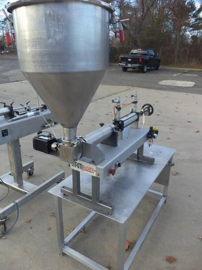 Used MRM/ELGIN Single Piston Air Operatd Filler, 60 Oz. Maxiumu Fill
