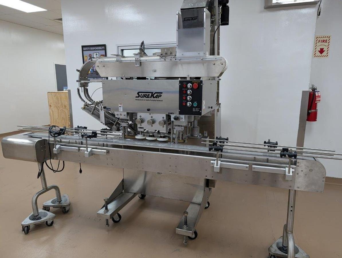 Used Surekap SK6000 Six Spindle Capper, Pharma Use